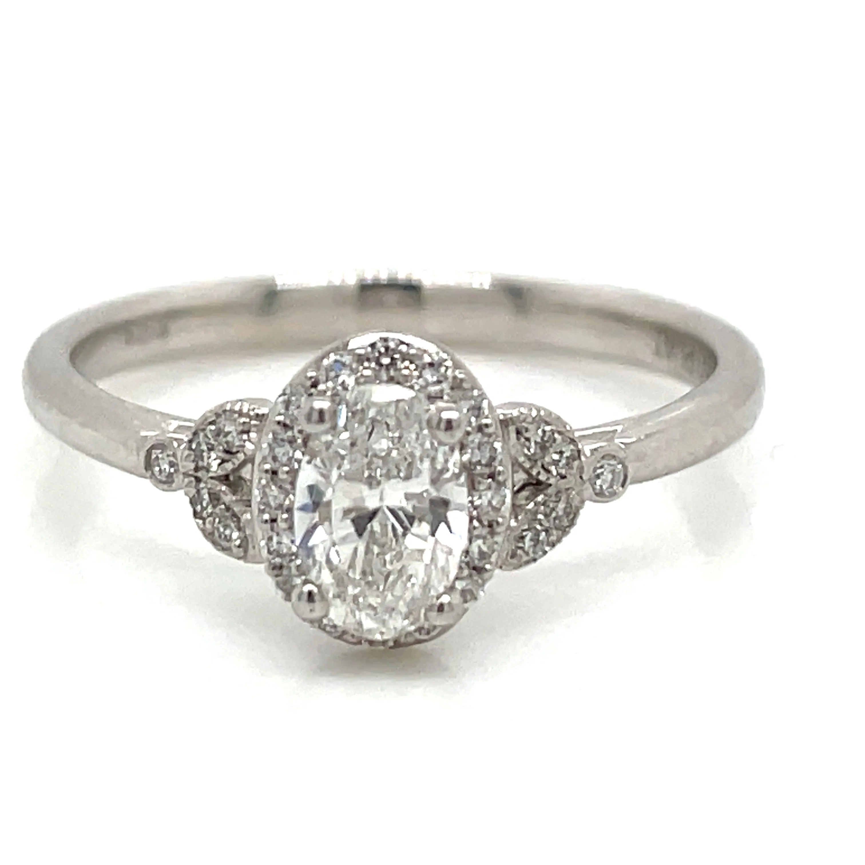 Avril - Platinum Natural 0.52ct Oval Halo Diamond Engagement Ring With Vintage Side Detail
