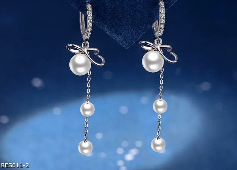 Long tassel pearl drop earrings