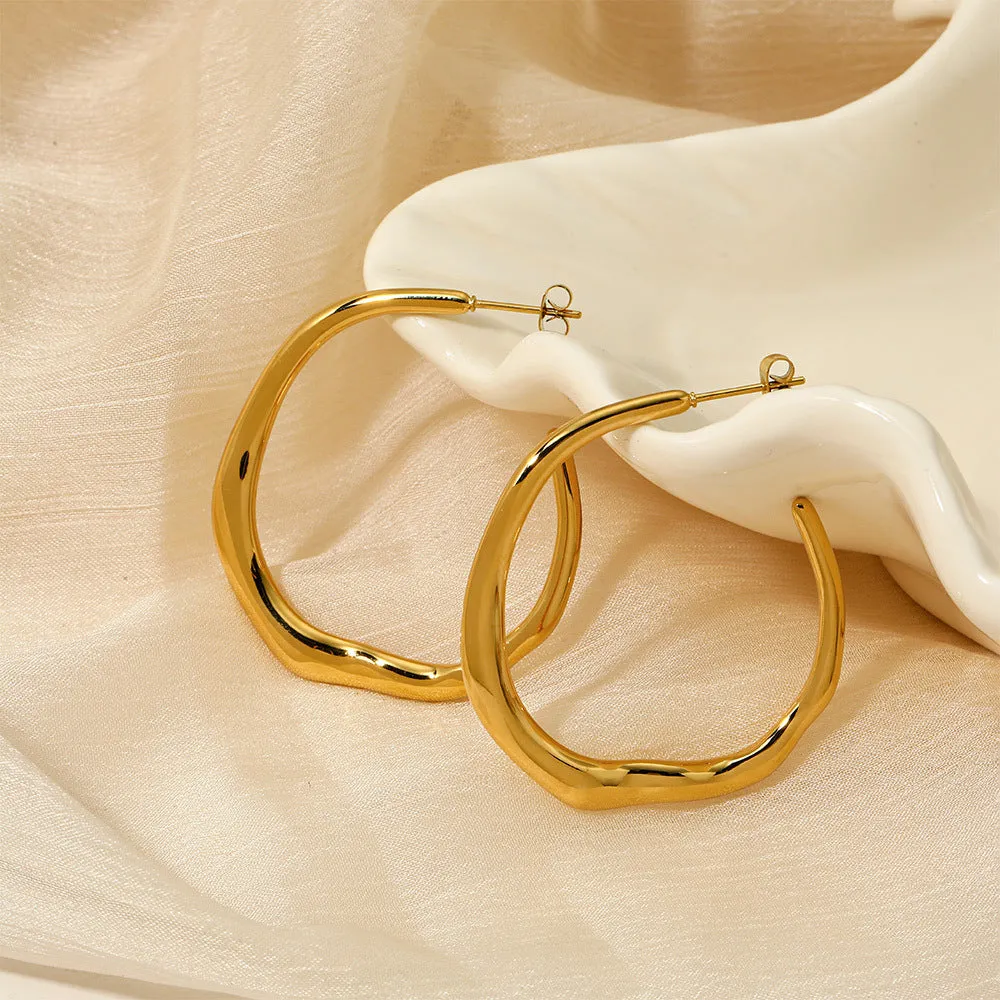 THE UNEVEN HOOP EARRINGS