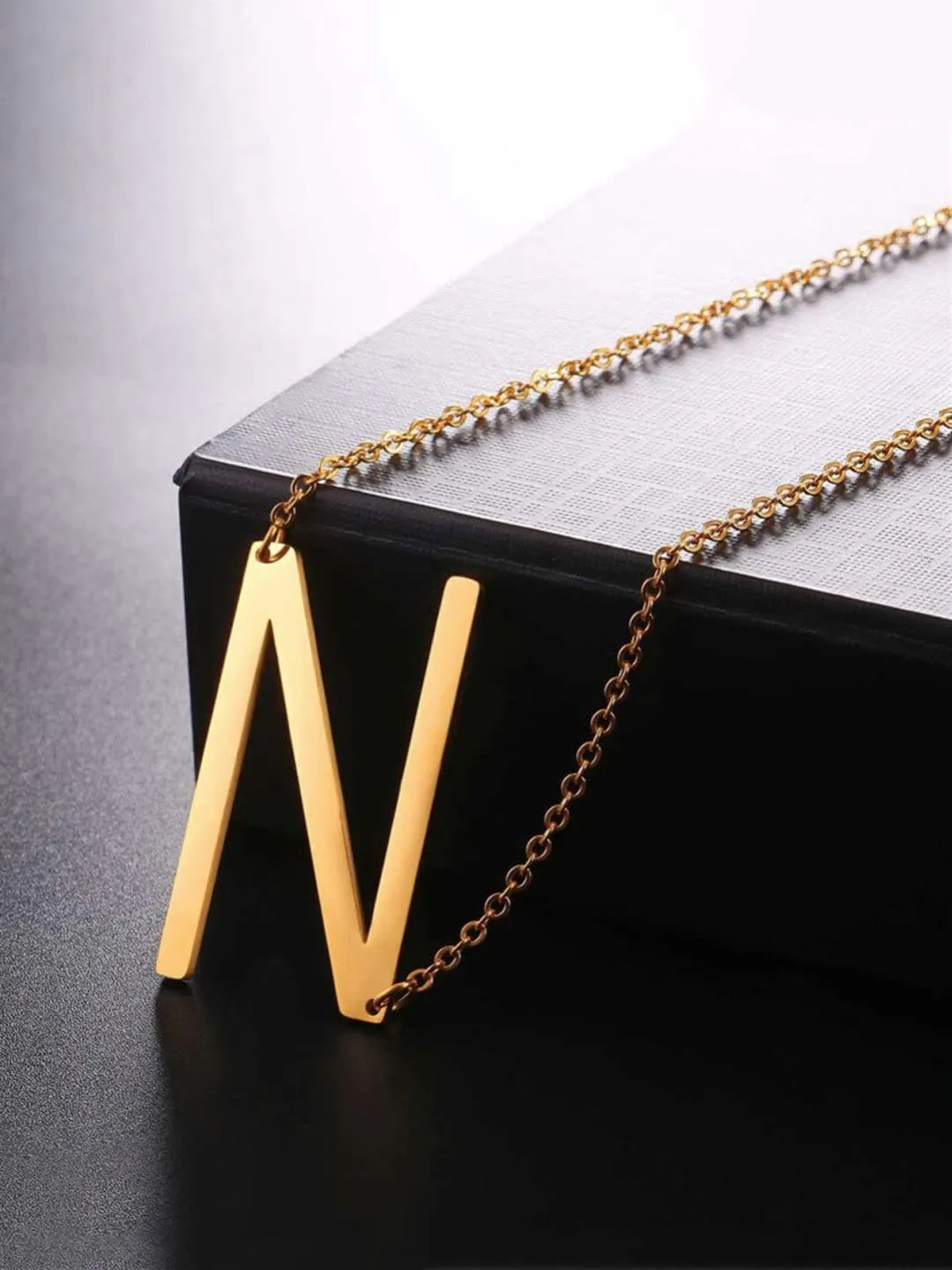 Yellow Chimes Alphabet Pendant Necklace for Women Alphabet N Initial Golden Pendant Stainless Steel Gold Plated Big Chain Pendant for Women and Men.